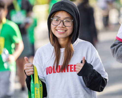 A volunteer at the Heart & Soles Run